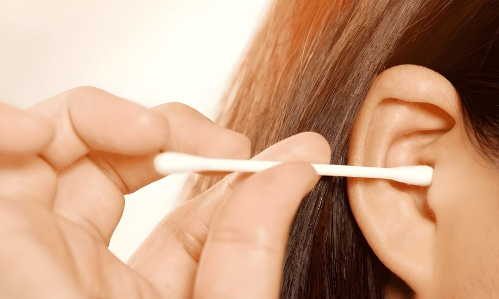 Banner image for ClearEar Belfast article on causes of ear wax build-up.